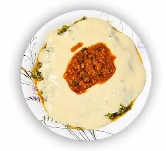 Cheese Laziz dosa topped with cheese and masala